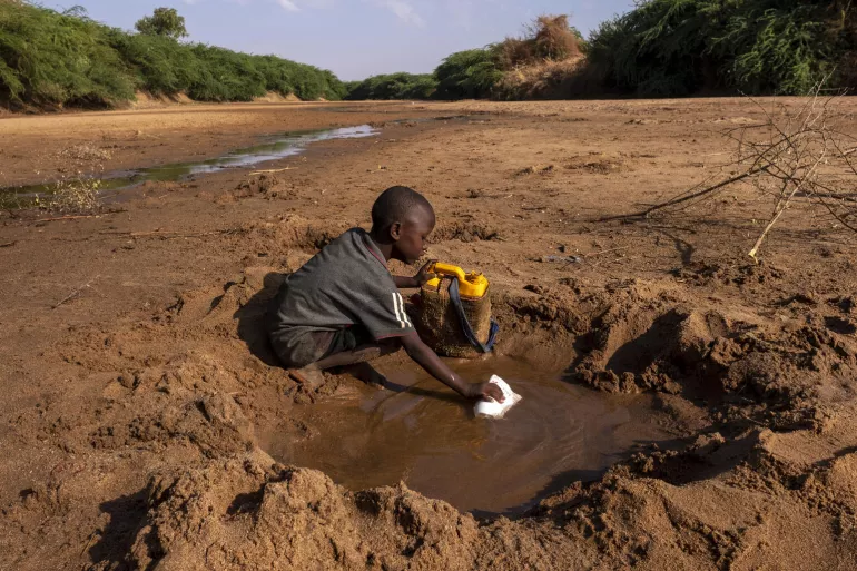 Hands washing under tap